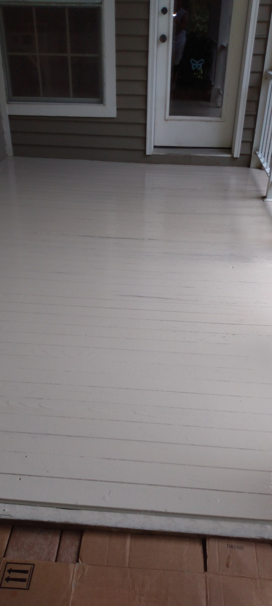 Porch decking refinished in a fresh, even coat