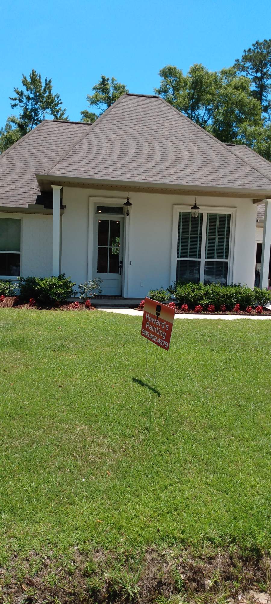 Home exterior repainted crisp white